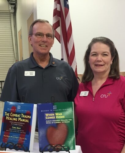 Steve and Karen Dorner smiling with Combat Trauma Healing Manual and When War Comes Home books
